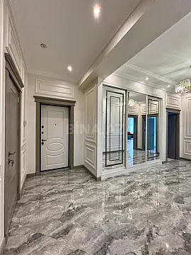 Satılır 4 otaqlı mənzil 165.7 m²
