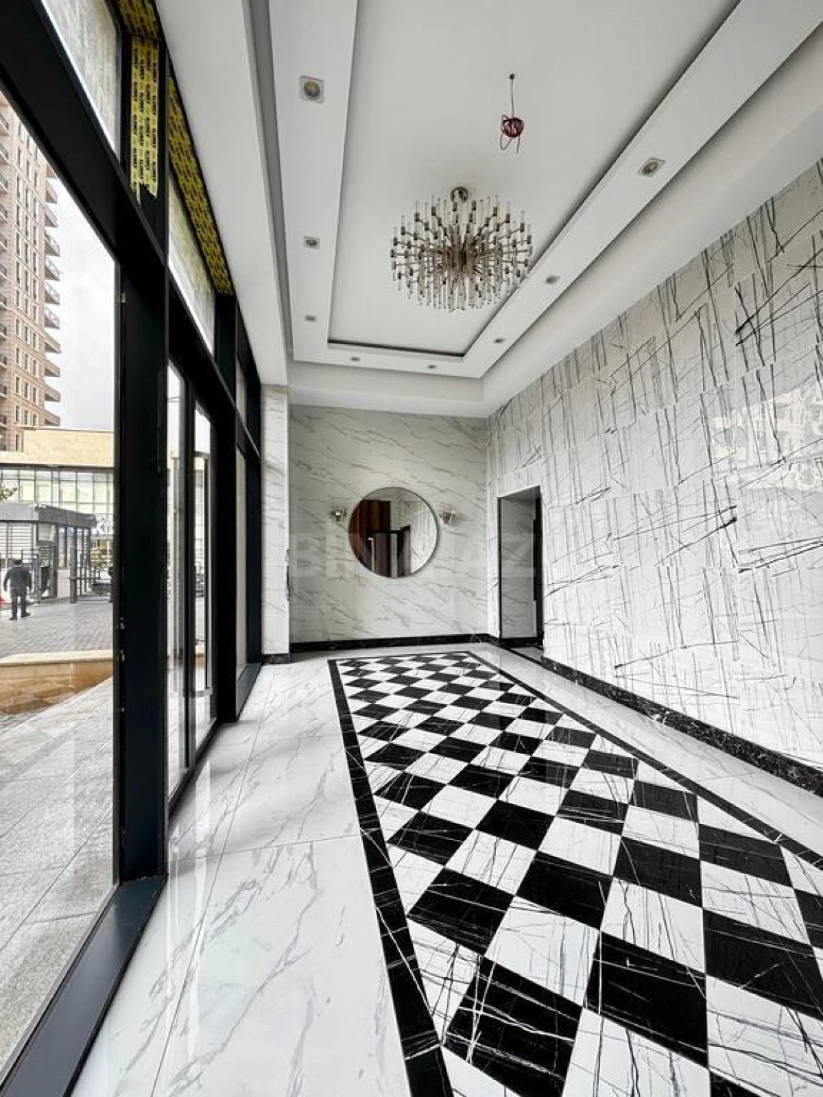 Satılır 4 otaqlı mənzil 165.7 m²
