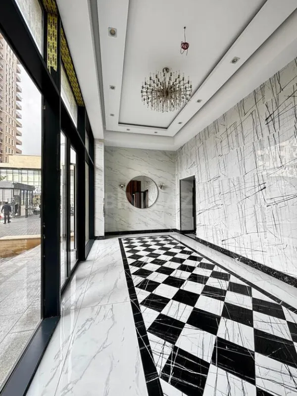 Satılır 4 otaqlı mənzil 165.7 m²