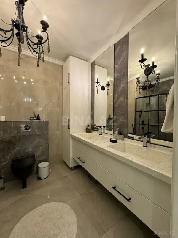 Satılır 3 otaqlı mənzil 141 m²