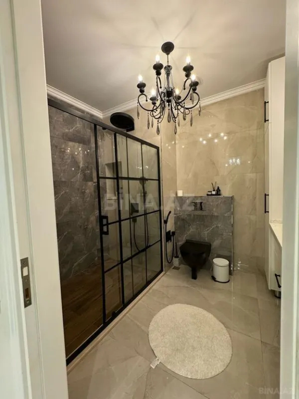 Satılır 3 otaqlı mənzil 141 m²