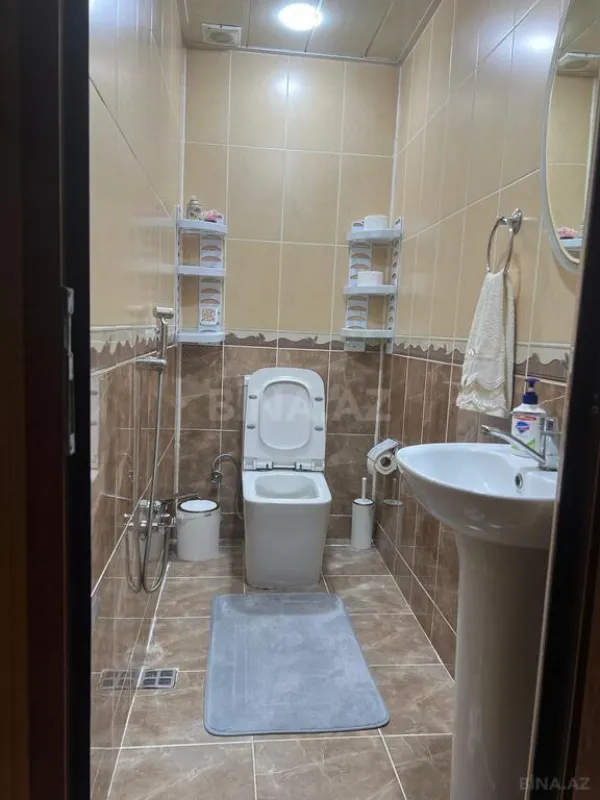 Satılır 4 otaqlı mənzil 136 m²