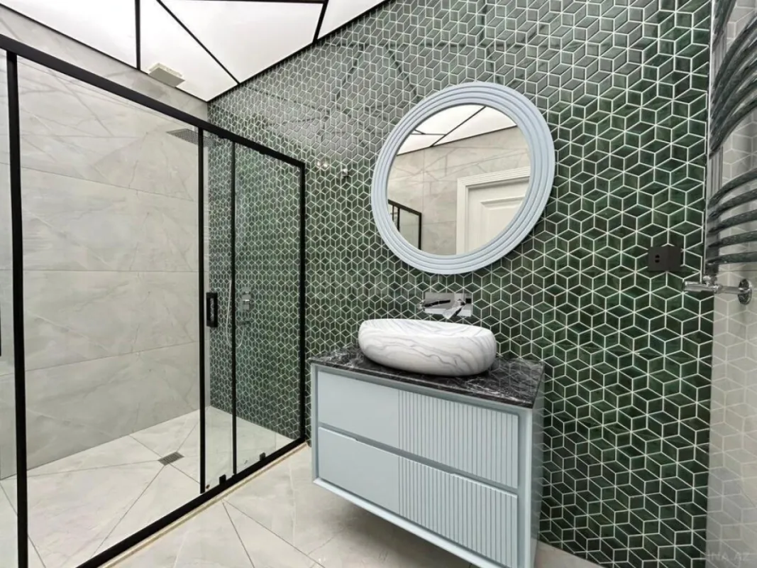 Satılır 3 otaqlı mənzil 134.8 m²