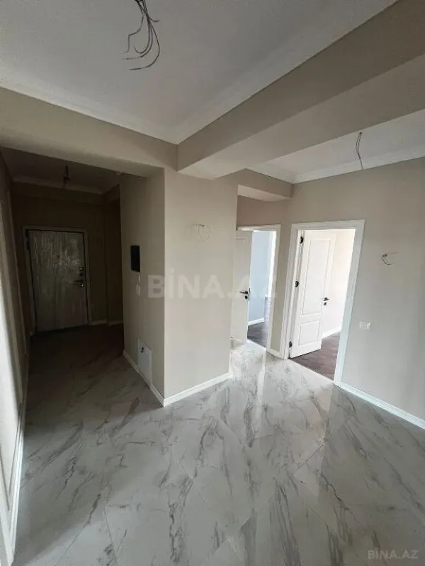Satılır 4 otaqlı mənzil 121 m²
