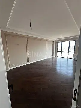 Satılır 4 otaqlı mənzil 121 m²