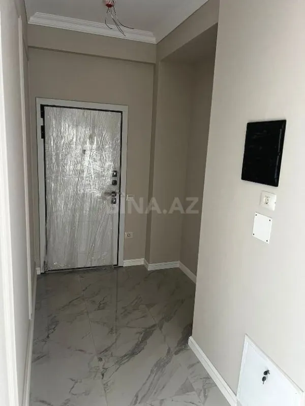 Satılır 4 otaqlı mənzil 121 m²