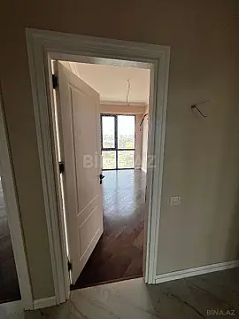 Satılır 4 otaqlı mənzil 121 m²