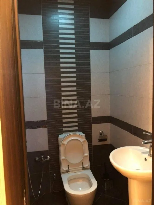 Satılır 4 otaqlı mənzil 151 m²