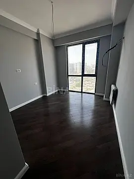 Satılır 4 otaqlı mənzil 121 m²