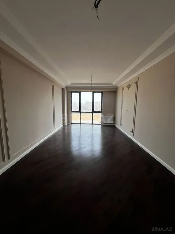 Satılır 4 otaqlı mənzil 121 m²