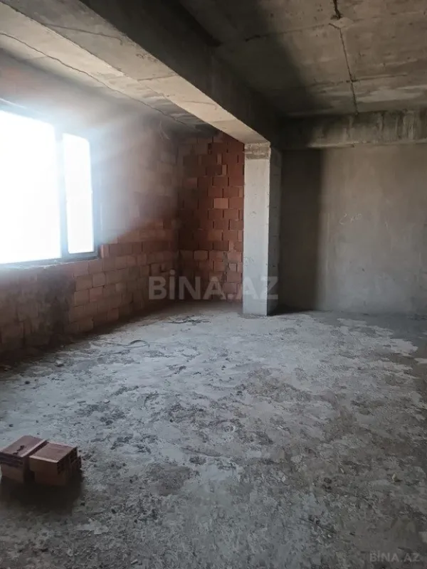 Satılır 4 otaqlı mənzil 202 m²