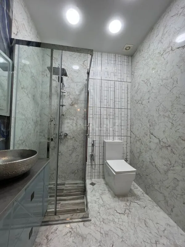 Satılır 4 otaqlı mənzil 168 m²
