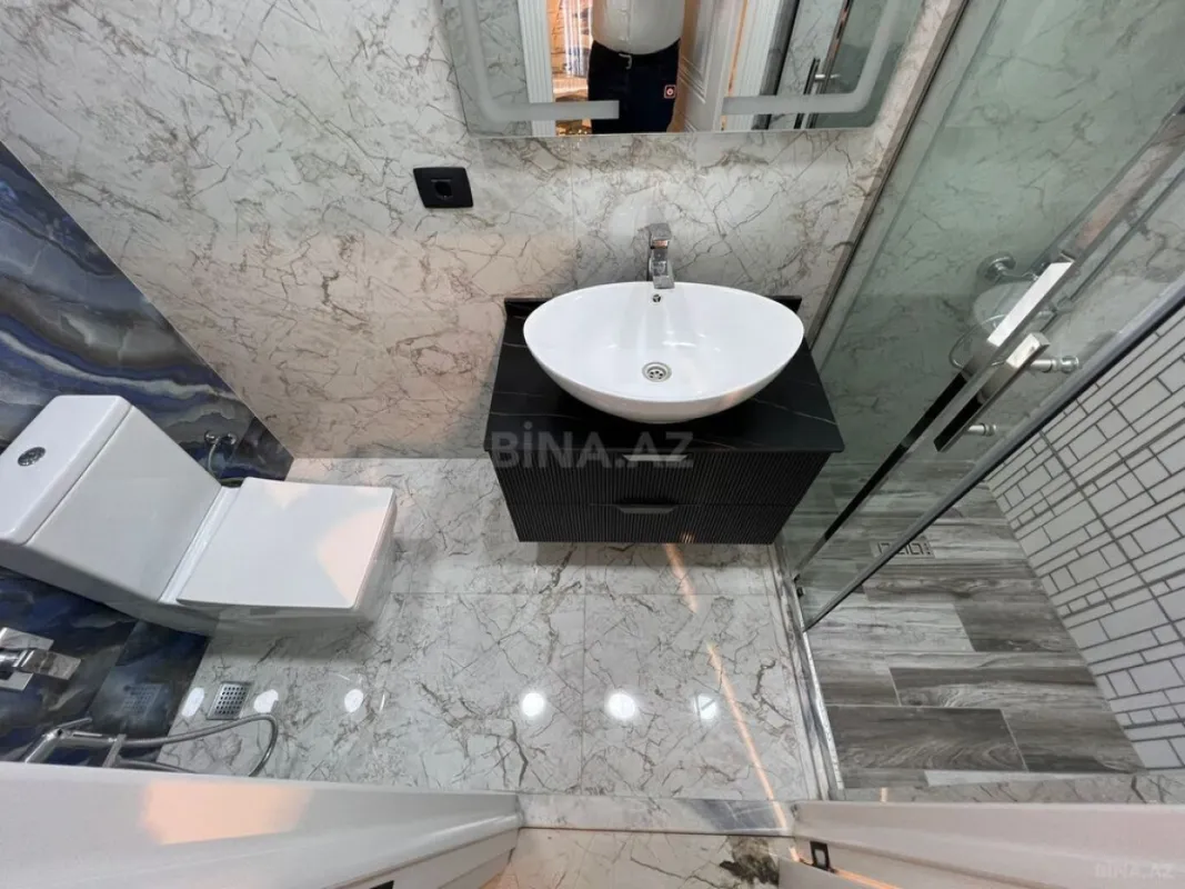 Satılır 4 otaqlı mənzil 168 m²