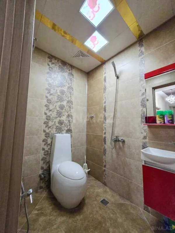 Satılır 4 otaqlı mənzil 145 m²