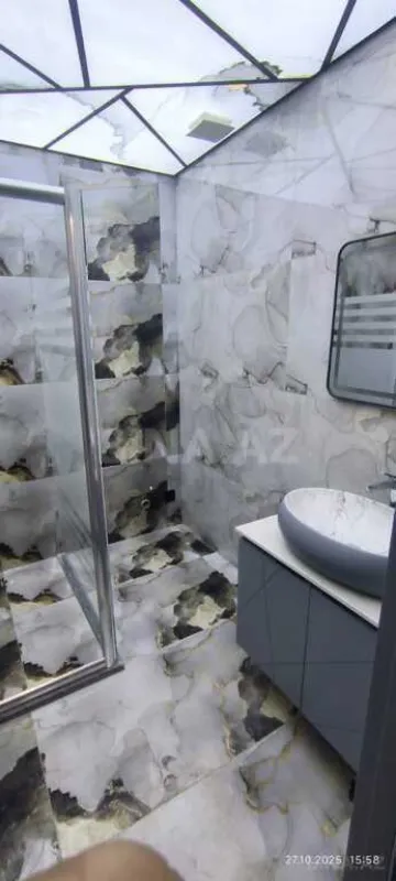 Satılır 4 otaqlı mənzil 165 m²