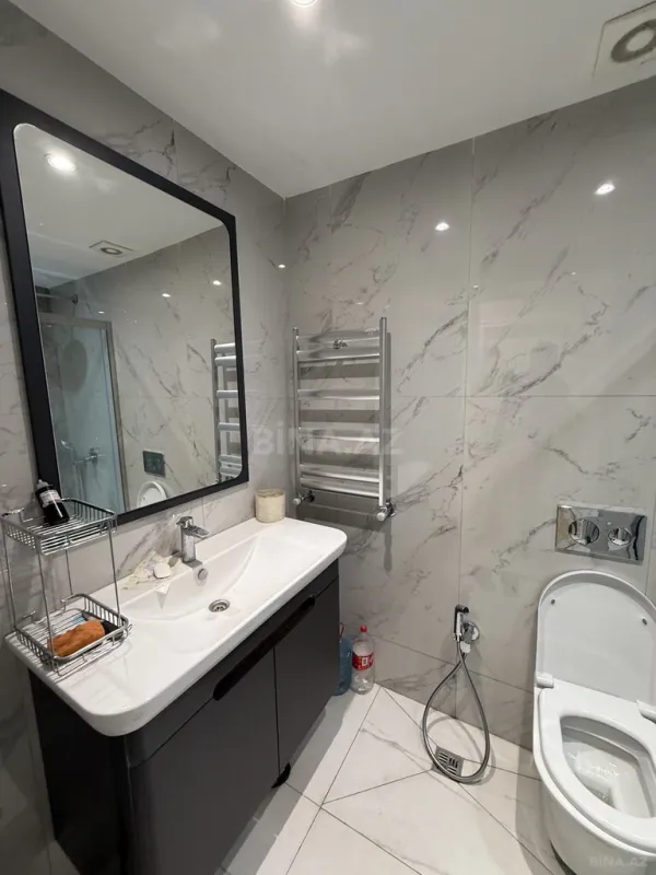 Satılır 4 otaqlı mənzil 127 m²