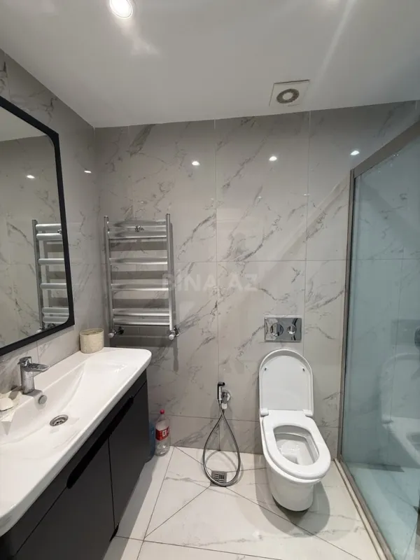 Satılır 4 otaqlı mənzil 127 m²