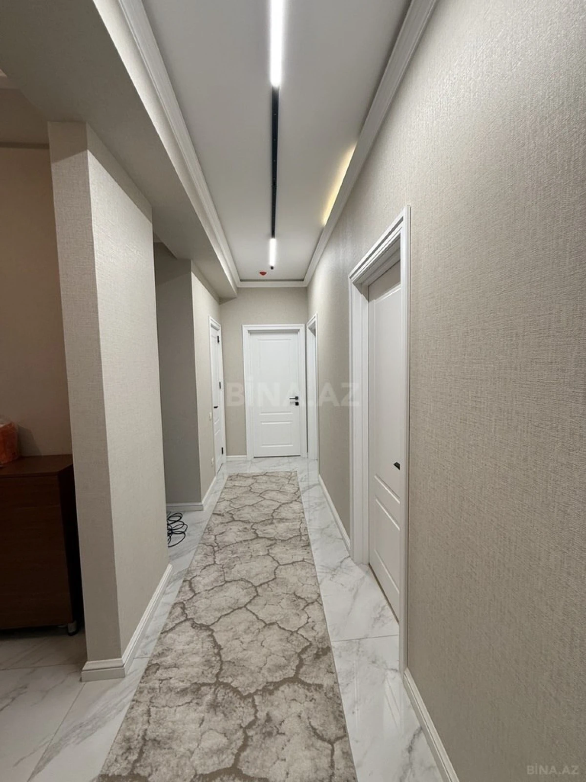 Satılır 4 otaqlı mənzil 127 m²
