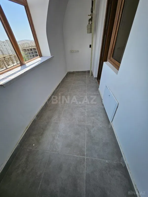 Satılır 4 otaqlı mənzil 122 m²