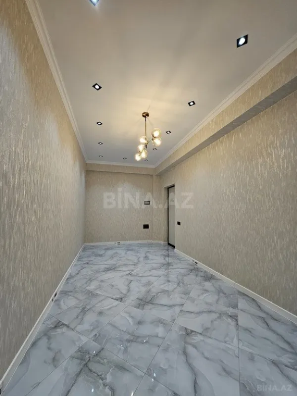 Satılır 4 otaqlı mənzil 122 m²