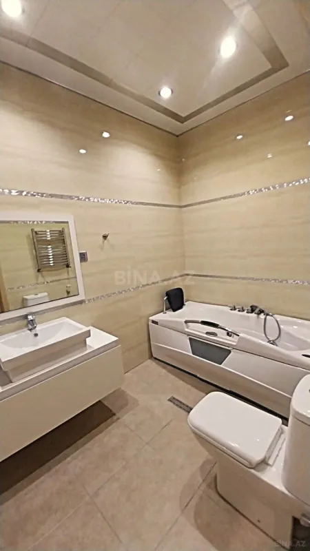 Satılır 4 otaqlı mənzil 210 m²