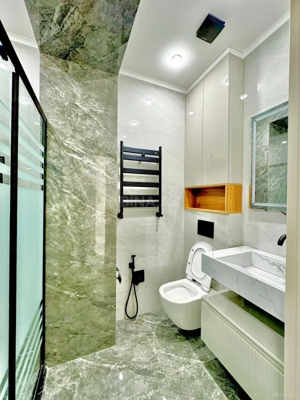 Satılır 2 otaqlı mənzil 77 m²