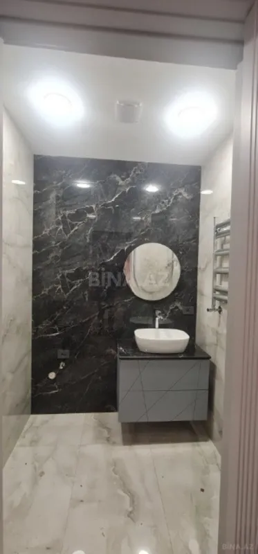Satılır 5 otaqlı mənzil 202 m²