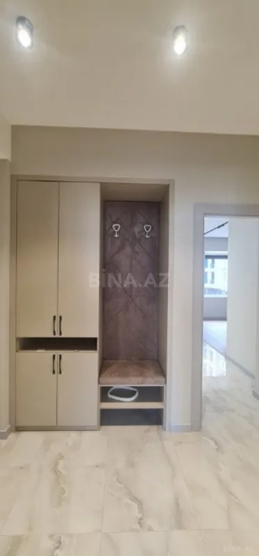 Satılır 5 otaqlı mənzil 202 m²