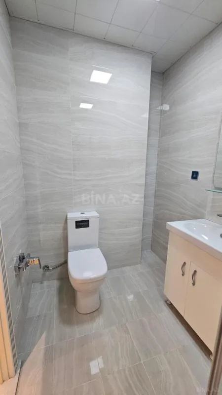 Satılır 3 otaqlı mənzil 141 m²