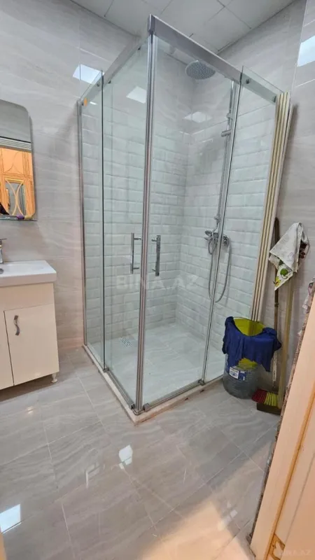 Satılır 3 otaqlı mənzil 141 m²