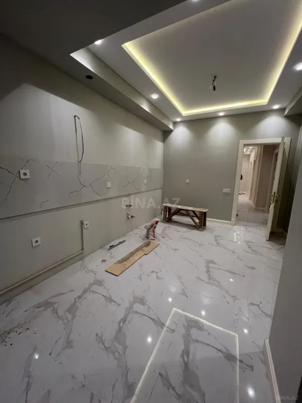 Satılır 3 otaqlı mənzil 138 m²
