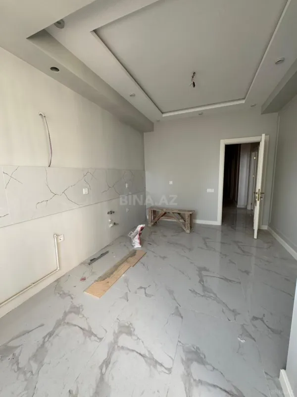 Satılır 3 otaqlı mənzil 138 m²