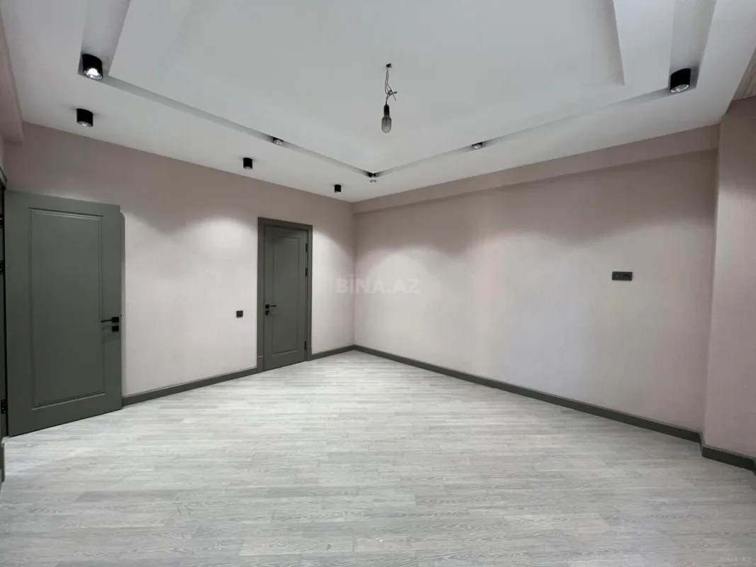Satılır 4 otaqlı mənzil 165 m²