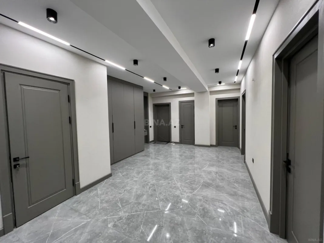 Satılır 4 otaqlı mənzil 165 m²