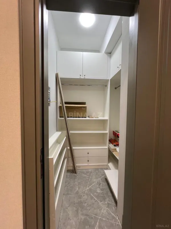 Satılır 4 otaqlı mənzil 165 m²