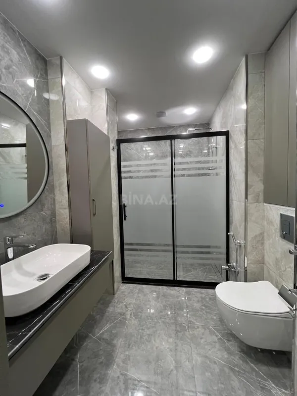 Satılır 4 otaqlı mənzil 165 m²