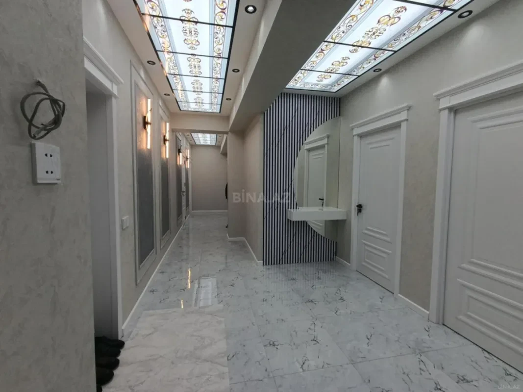 Satılır 4 otaqlı mənzil 153 m²