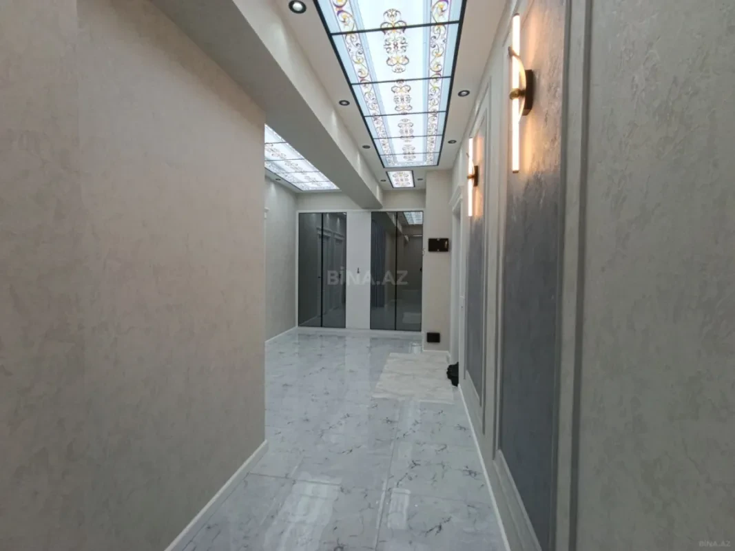 Satılır 4 otaqlı mənzil 153 m²