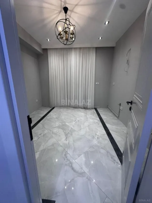 Satılır 4 otaqlı mənzil 161 m²