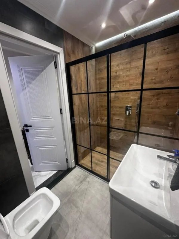 Satılır 4 otaqlı mənzil 161 m²