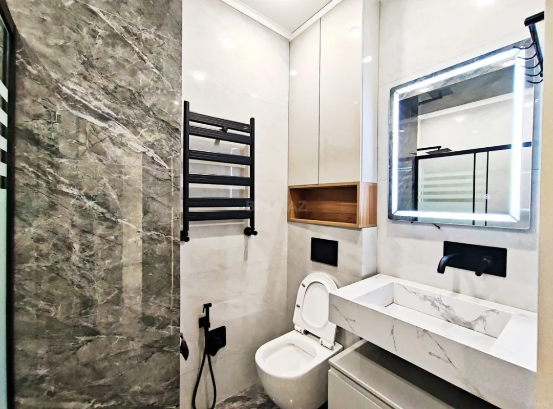 Satılır 2 otaqlı mənzil 76.1 m²