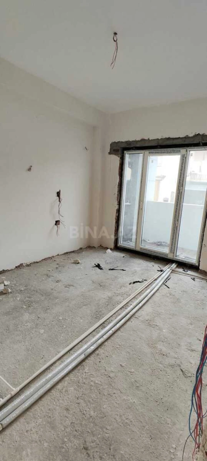 Satılır 2 otaqlı mənzil 99.3 m²