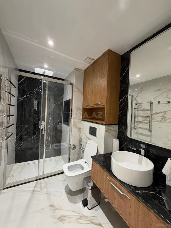 Satılır 4 otaqlı mənzil 167 m²