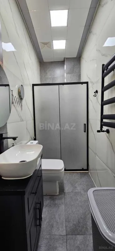 Satılır 4 otaqlı mənzil 130 m²