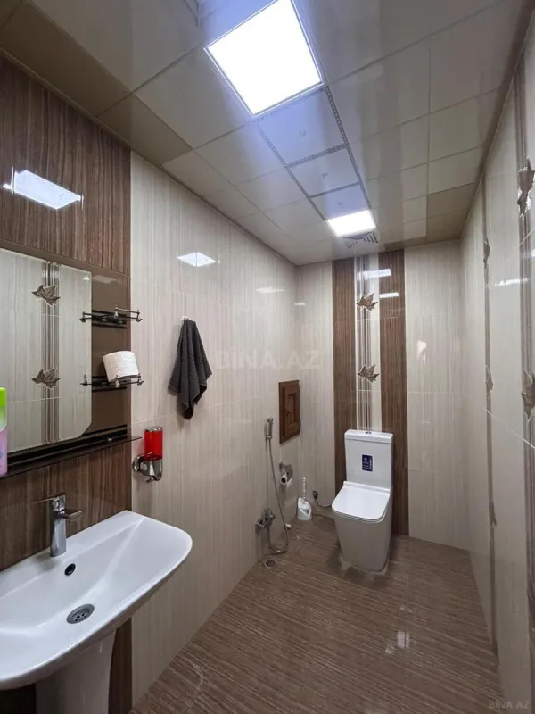 Satılır 4 otaqlı mənzil 162 m²