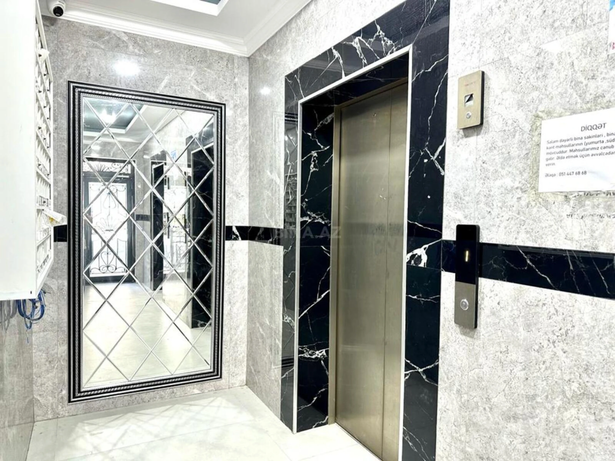 Satılır 4 otaqlı mənzil 121 m²