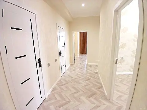 Satılır 4 otaqlı mənzil 121 m²