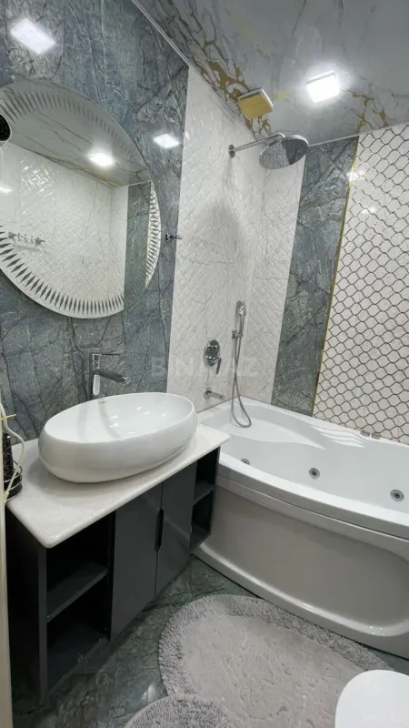 Satılır 4 otaqlı mənzil 140 m²