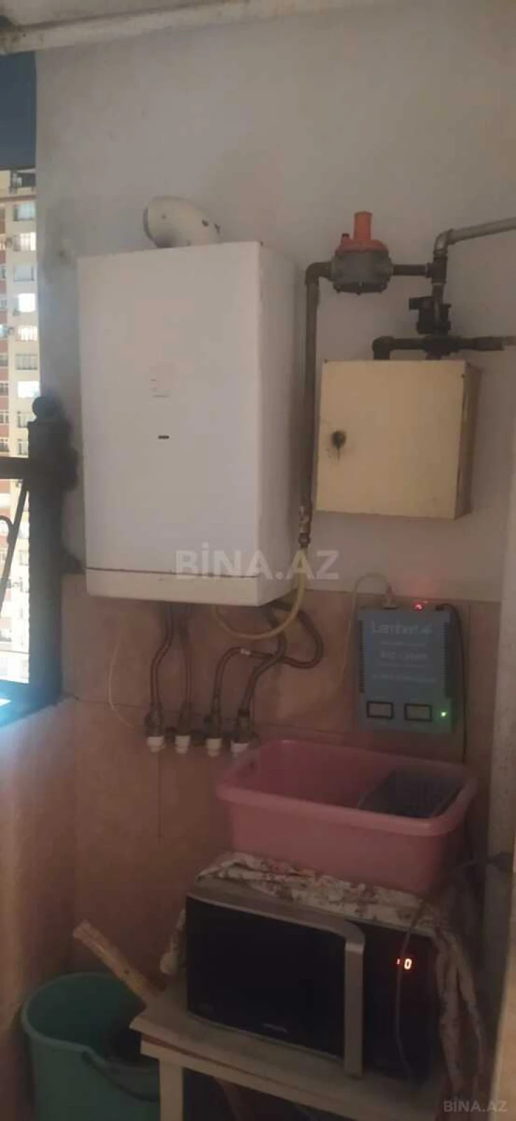 Satılır 4 otaqlı mənzil 165 m²