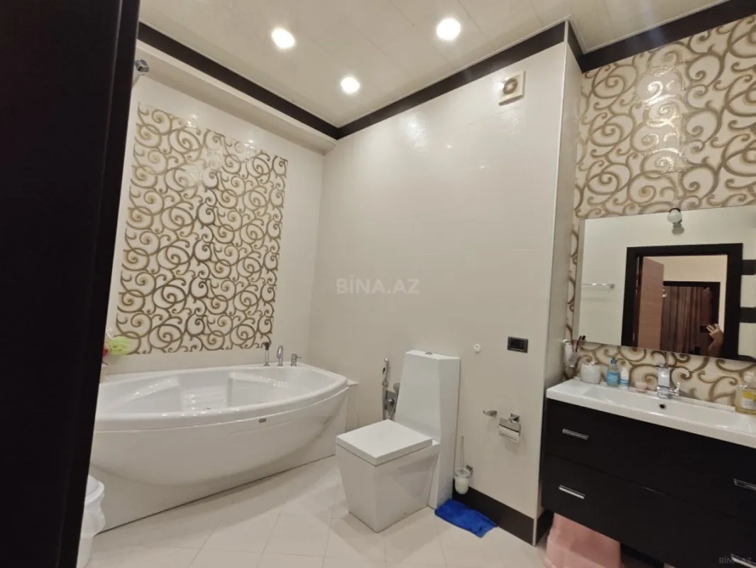 Satılır 4 otaqlı mənzil 210 m²